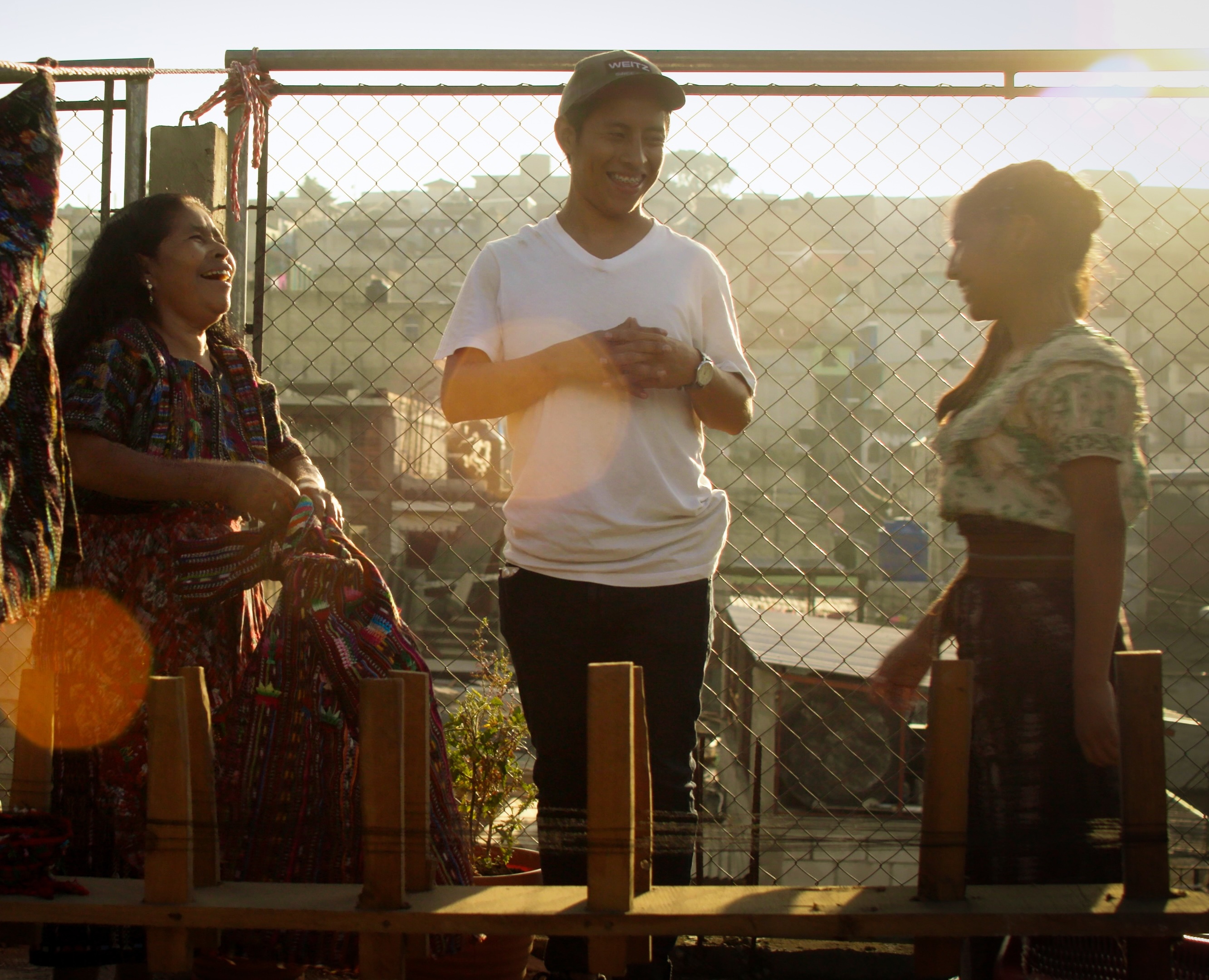 Three people laughing