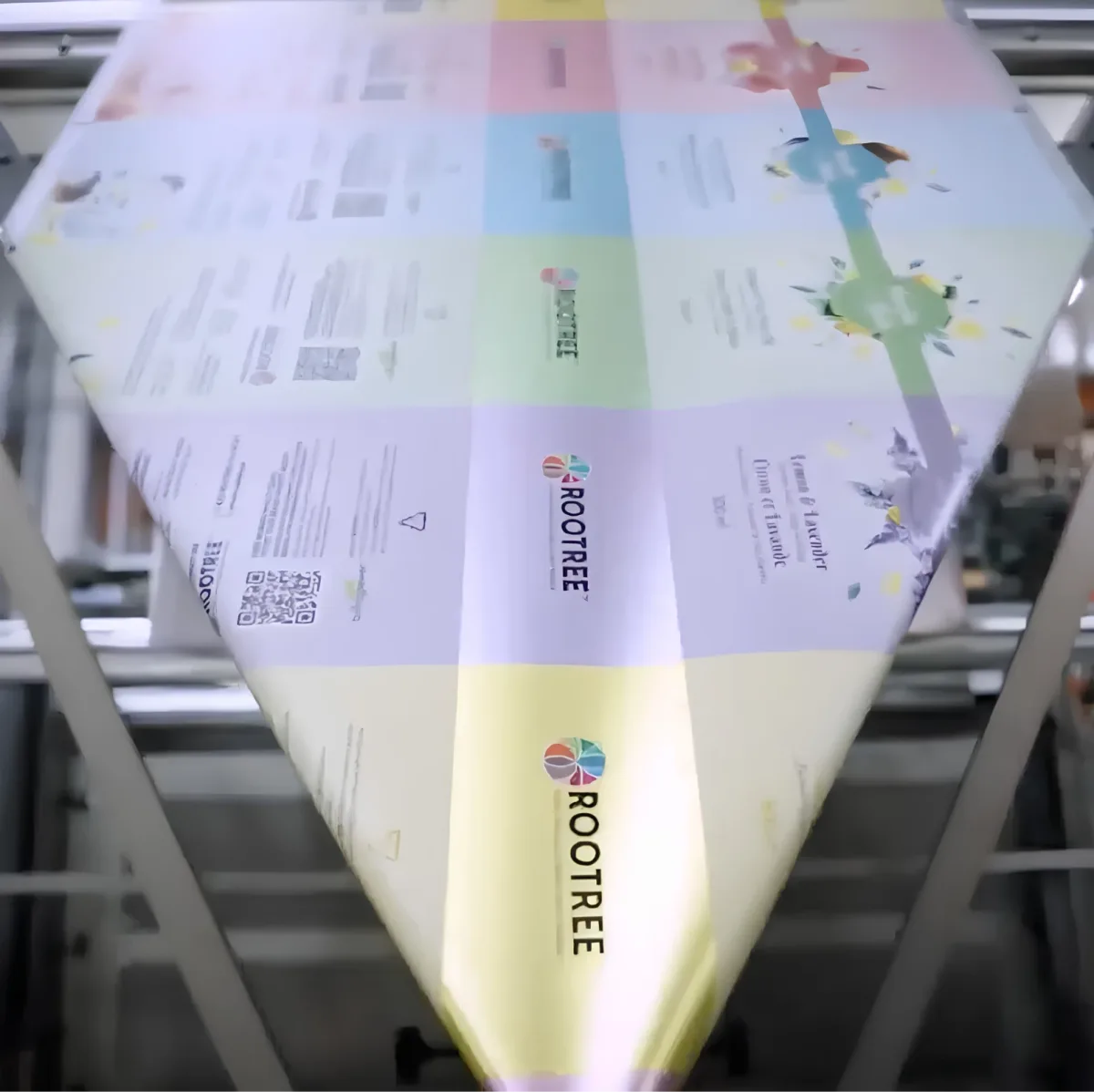 Printed packaging film with connected codes running through the production line