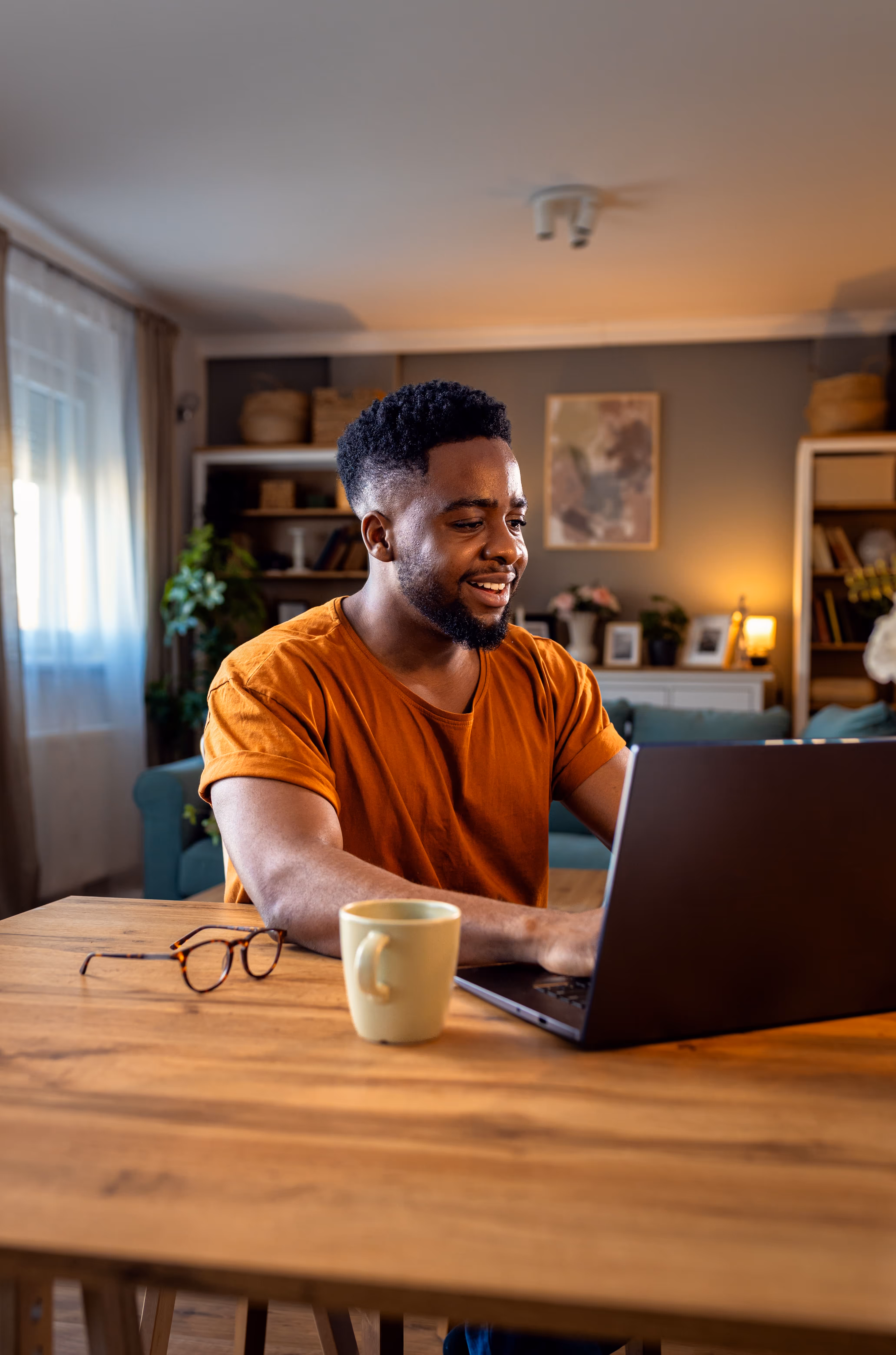 Photo of man working on computer