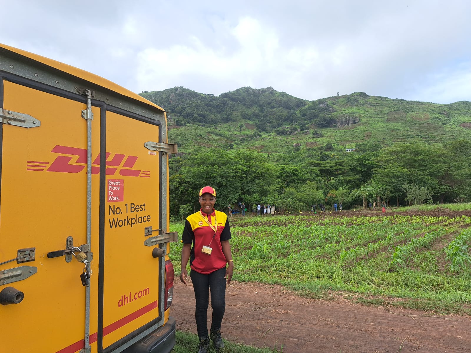 DHL truck and driver in Malawi for a Greenpop project