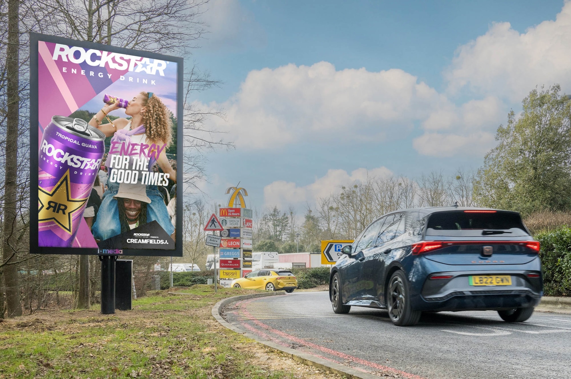 A DM6 digital screen showing a Rockstar Energy advertisement