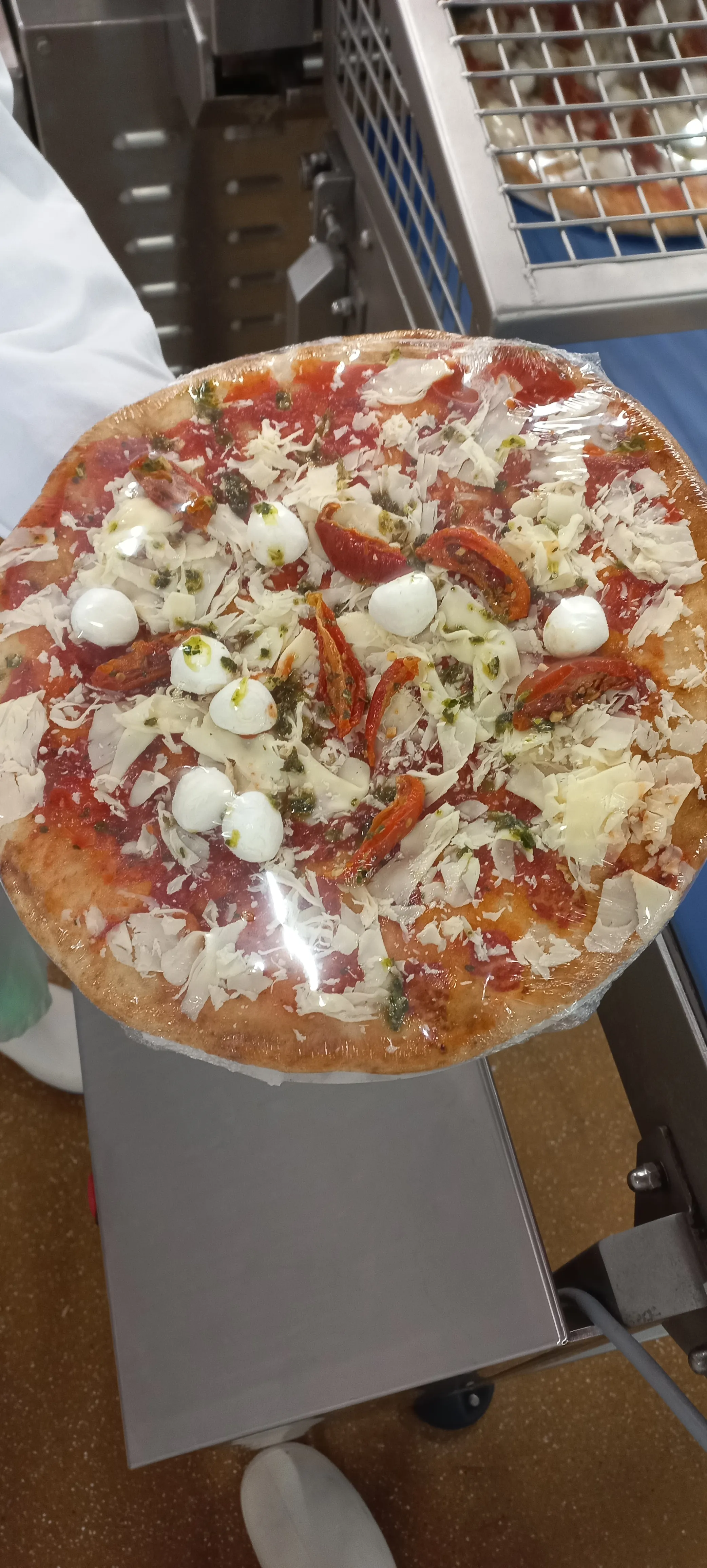 Pizza wrapped in Polyolefin.