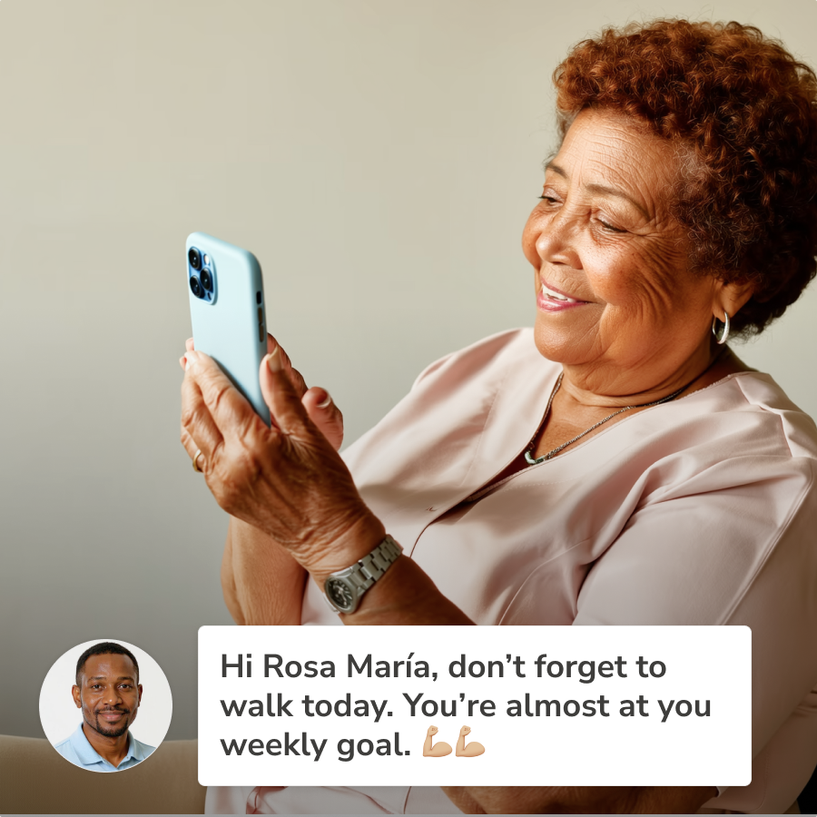 A woman holding a smartphone and communicating with her clinician