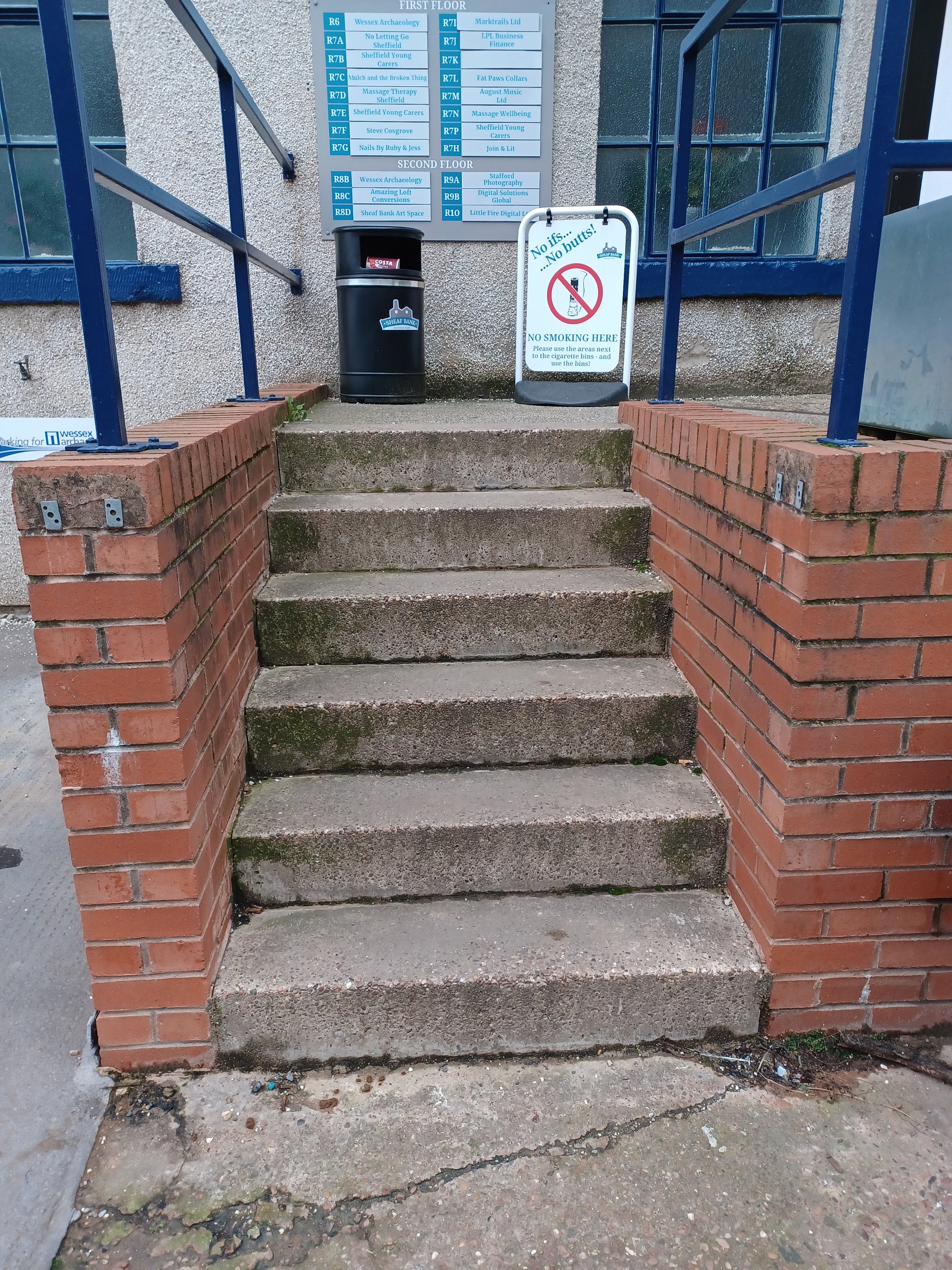 Image of six steps up to entrance of Riverside Block