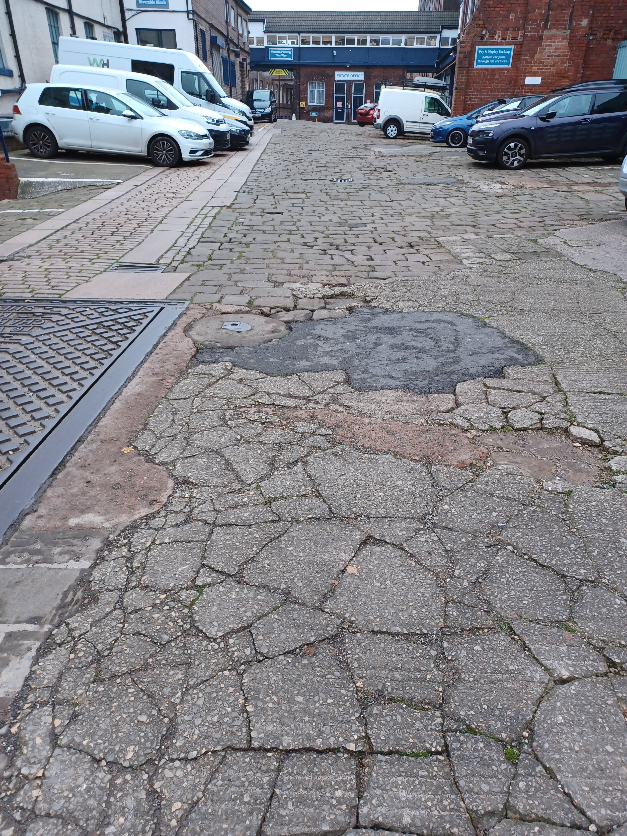 Image of the uneven cobbled terrain in the Sheaf Bank Business Park yard
