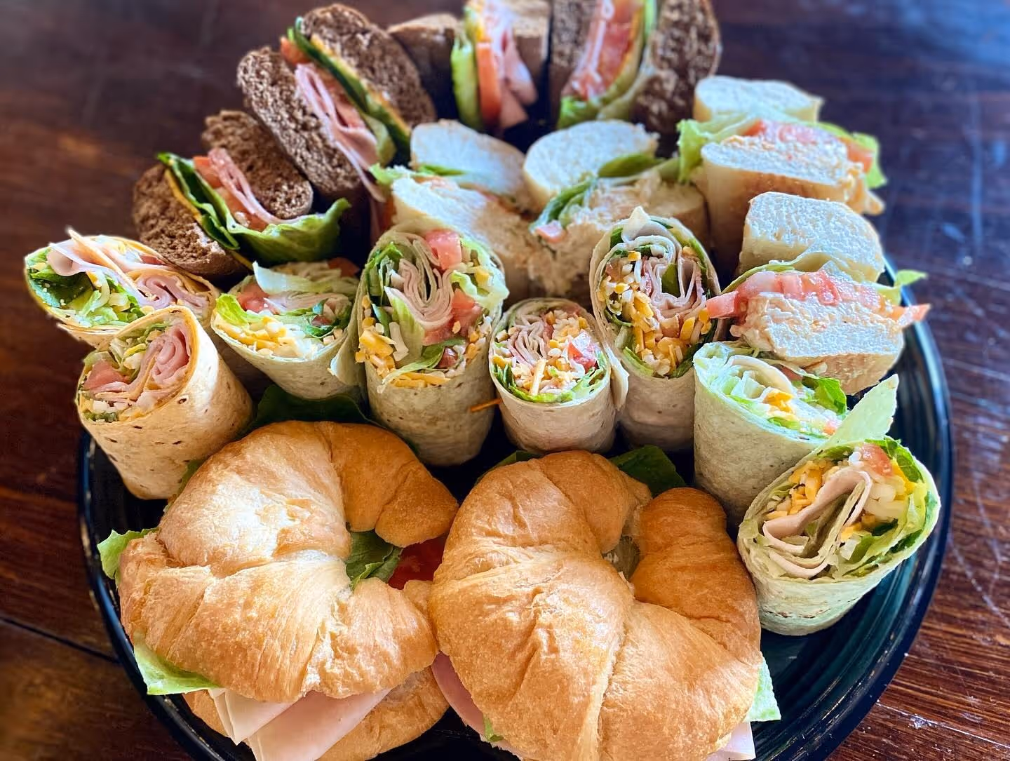 Lunch Catering with ham crossaints, chicken and ham wrapps and rye bread and ham ciabatta 