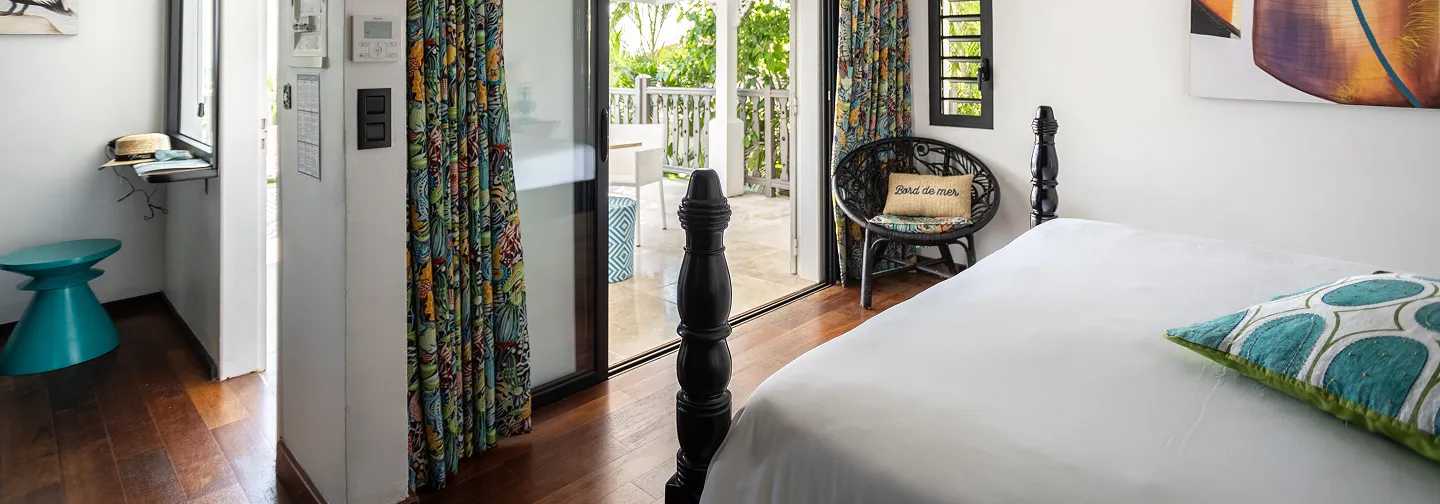 Villa rental at La Toubana Hotel & Spa, elegant room with direct access to the terrace in Guadeloupe.