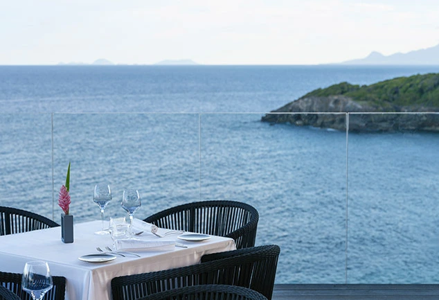 Dining table overlooking the sea in Guadeloupe