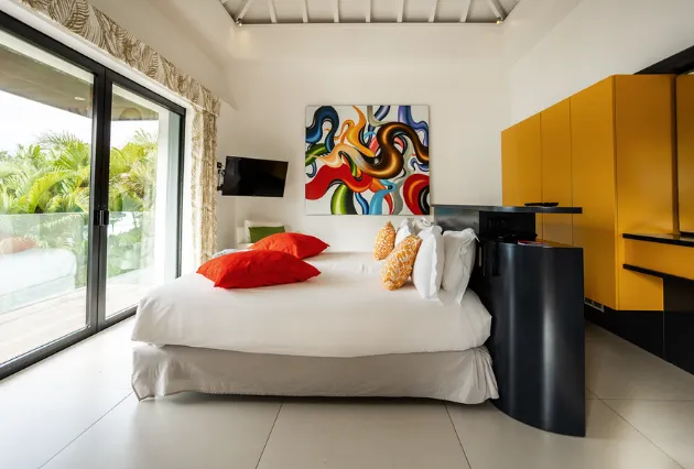 Chambre élégante de la villa Ura à La Toubana Hôtel & Spa, location de villa de luxe aux Caraïbes.