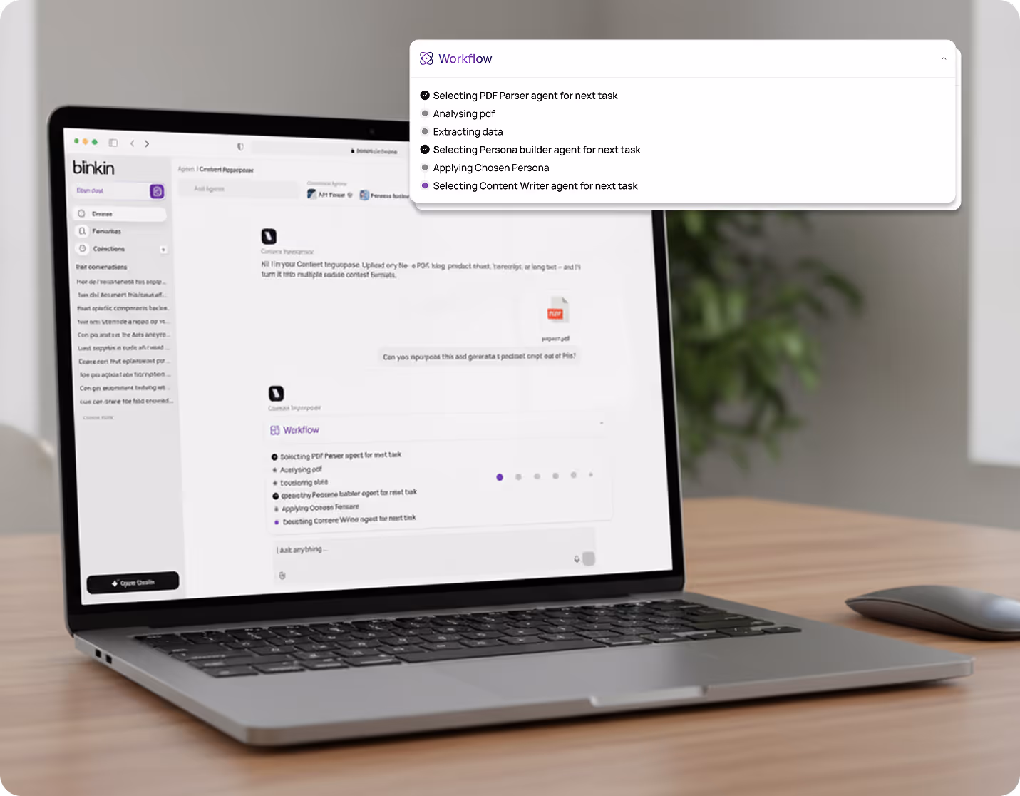 Laptop on wooden desk displaying Binkin app interface with workflow steps for selecting PDF parser, persona builder, and content writer agents.
