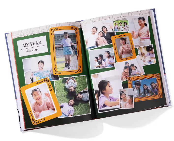 Open yearbook titled 'My Year Anna Lee' featuring multiple photos of a young girl in various activities.