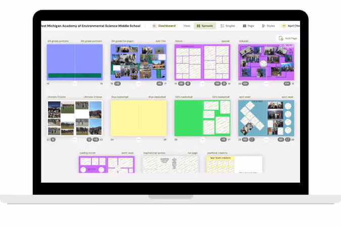 Laptop screen showing a school yearbook layout with pages for sports, quotes, and portraits on a dashboard.