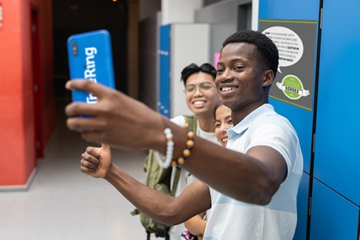 Three students take a selfie during National School Yearbook Week