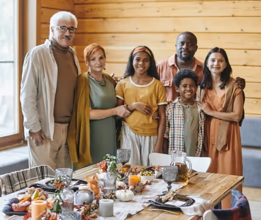 Family photo during the traditional Yerdsgiving meal at a middle school.