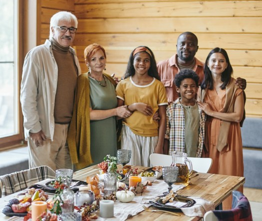 Family photo during the traditional Yerdsgiving meal at a middle school.