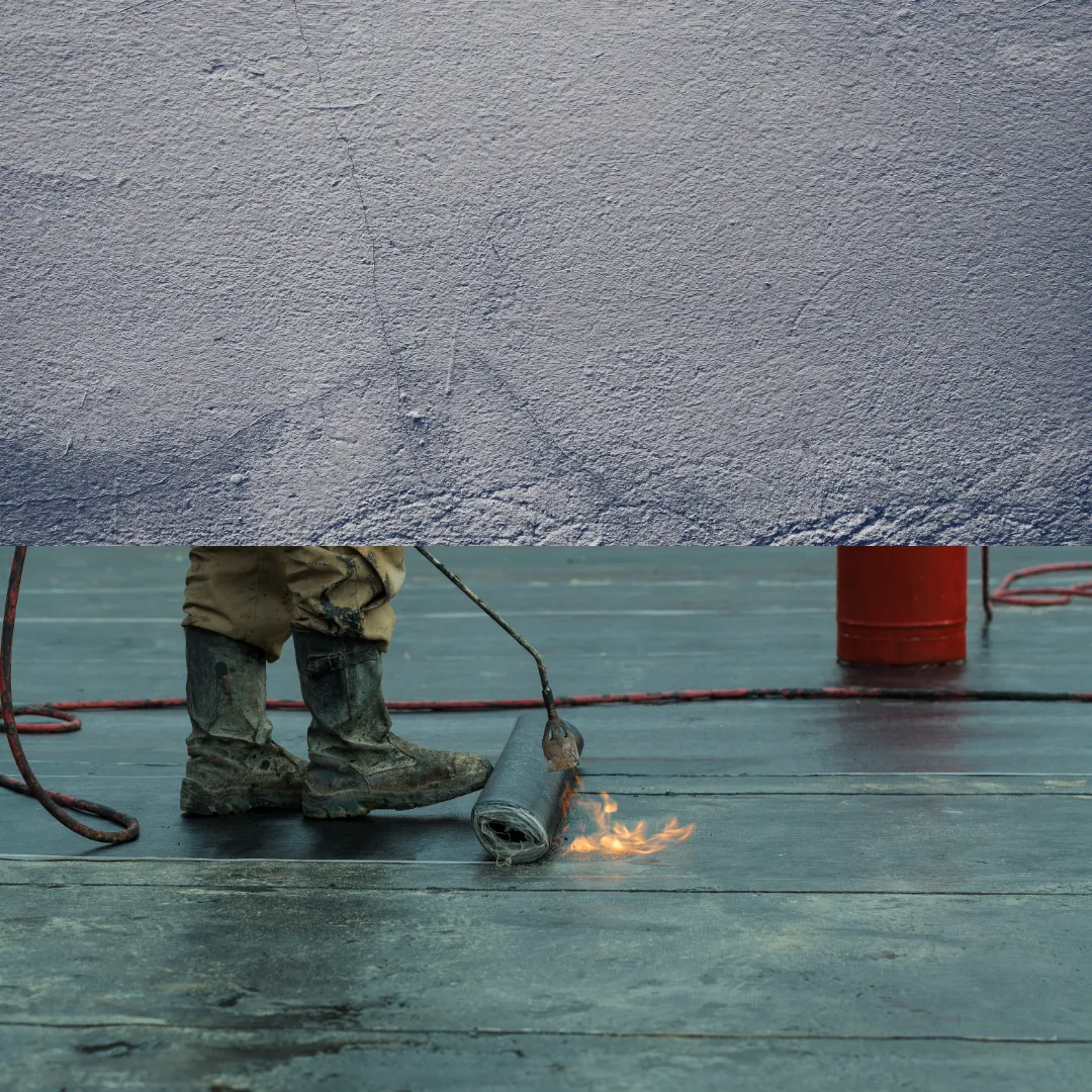 A man is painting a wall with a brush.