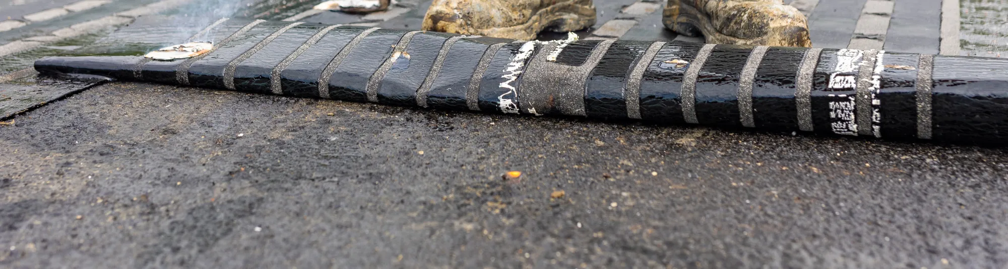 A black and white photo of a hockey stick.