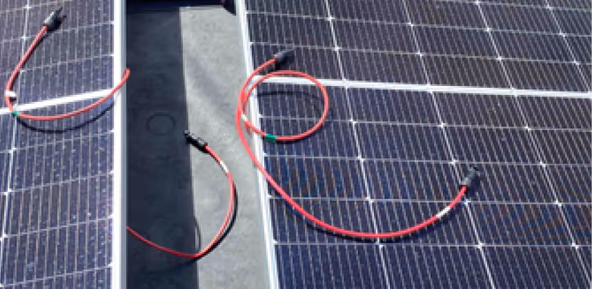 Solar Connectors unconnected on top of a solar panel