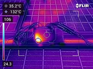 The image shows a thermal camera display from FLIR, highlighting an object at 35.2ￂﾰC amidst other temperature readings.AI-generated content may be incorrect.