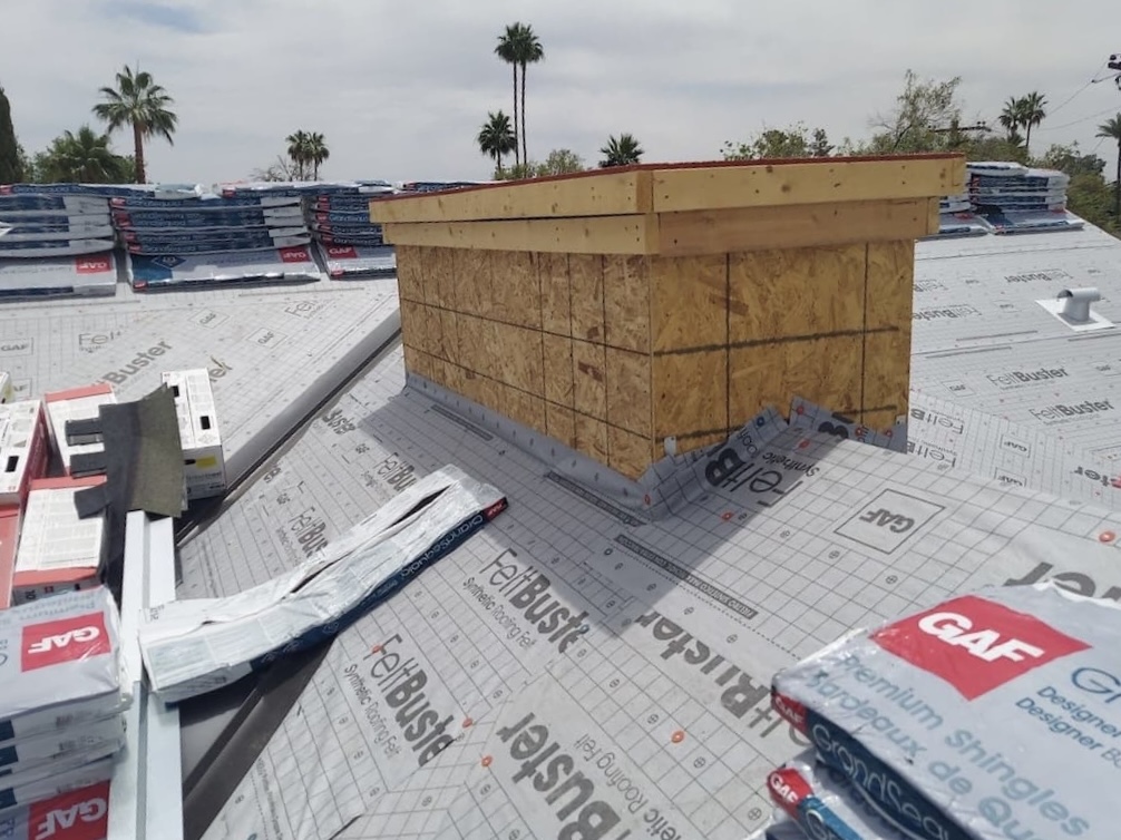 a new shingle roof being installed in Phoenix