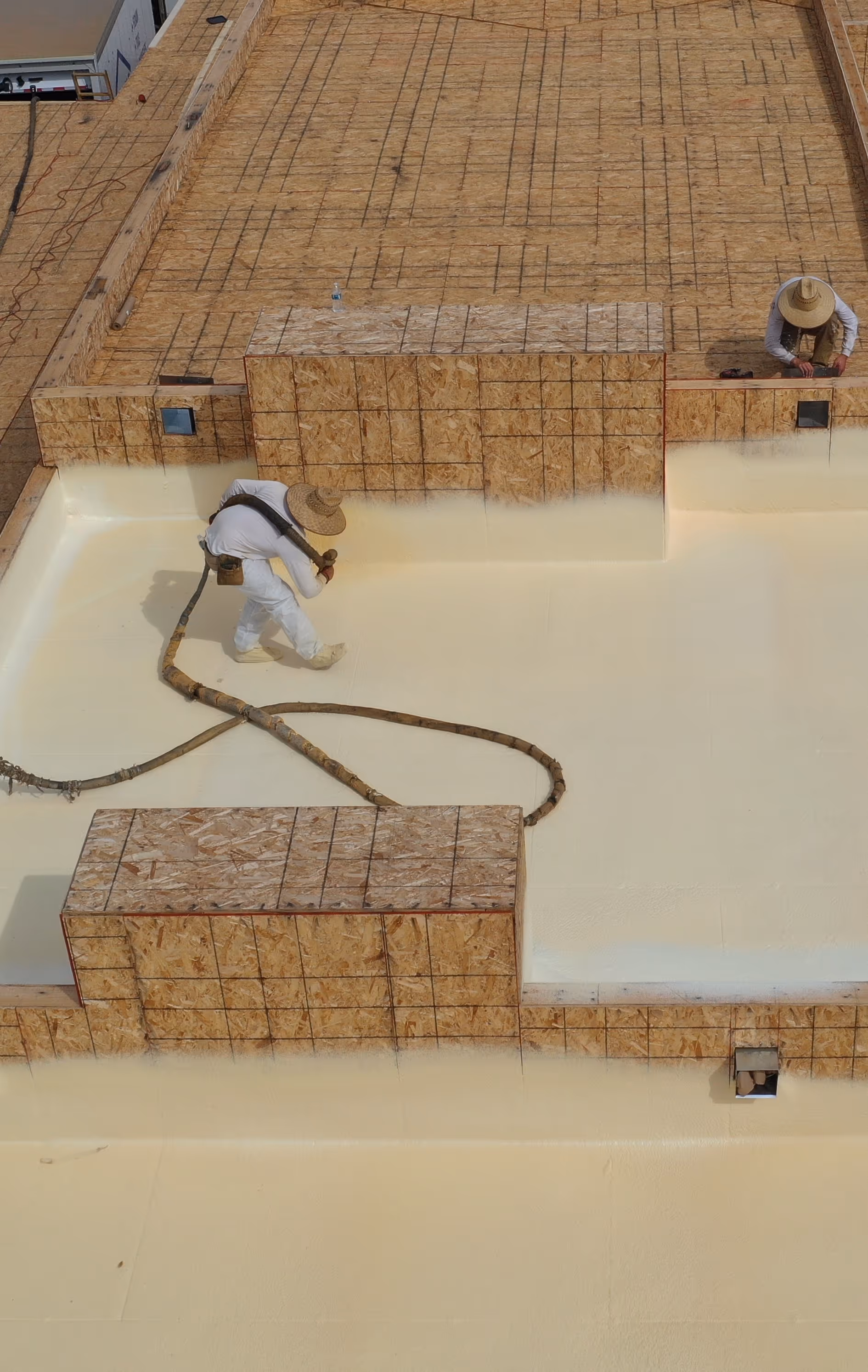 A Phoenix spray foam roof being installed by Pinnacle Roofing technicians