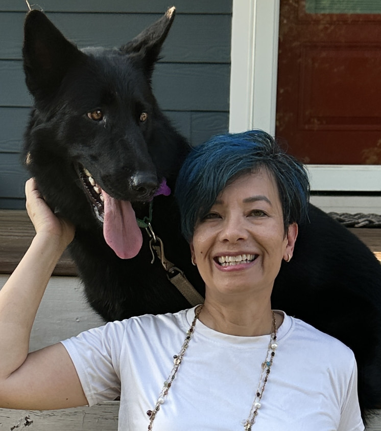 Picture of Val Collins with her dog Kona