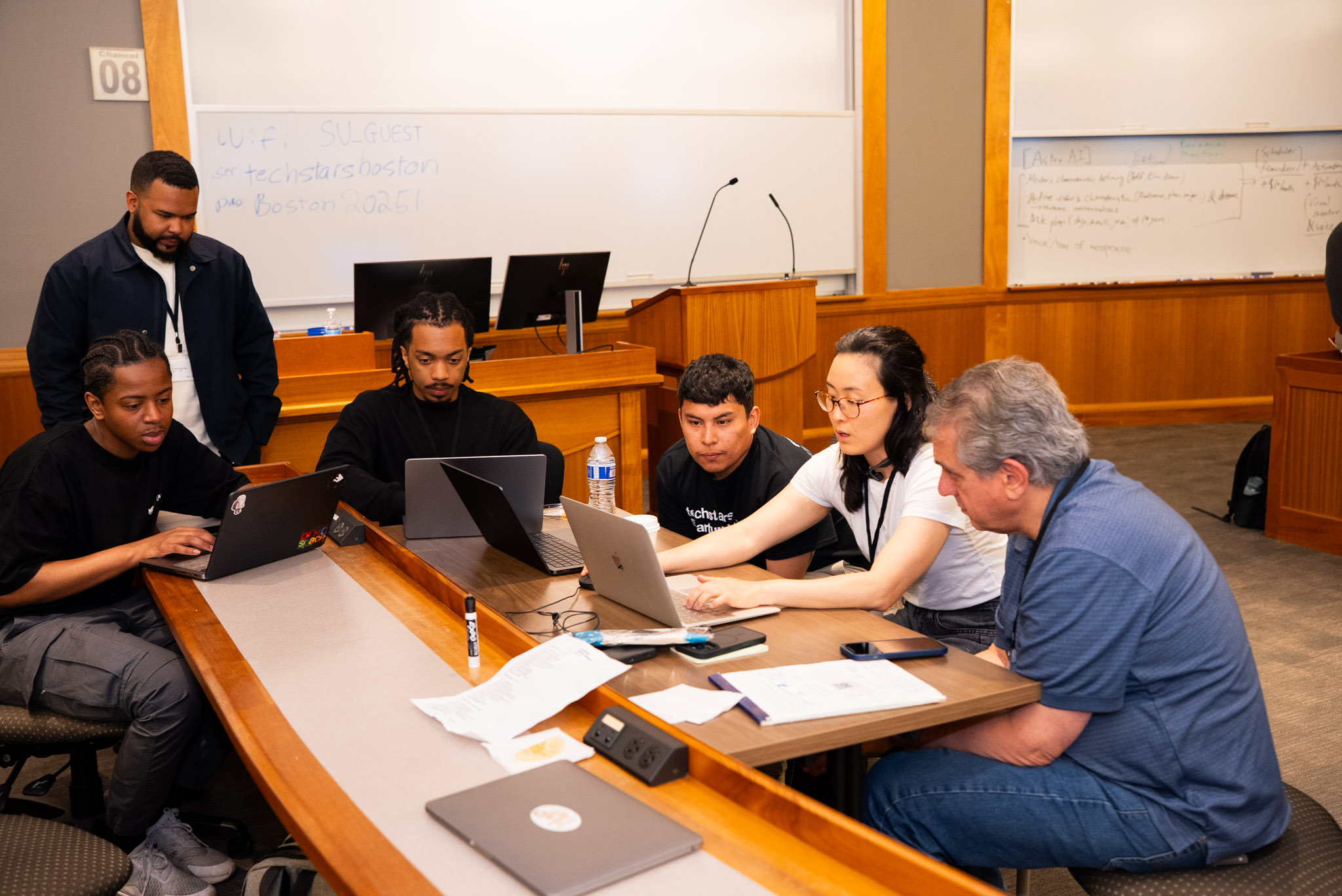 Team of founders and developers collaborating on an MVP at Techstars Startup Weekend, the ultimate hands-on event for building startups in 54 hours.