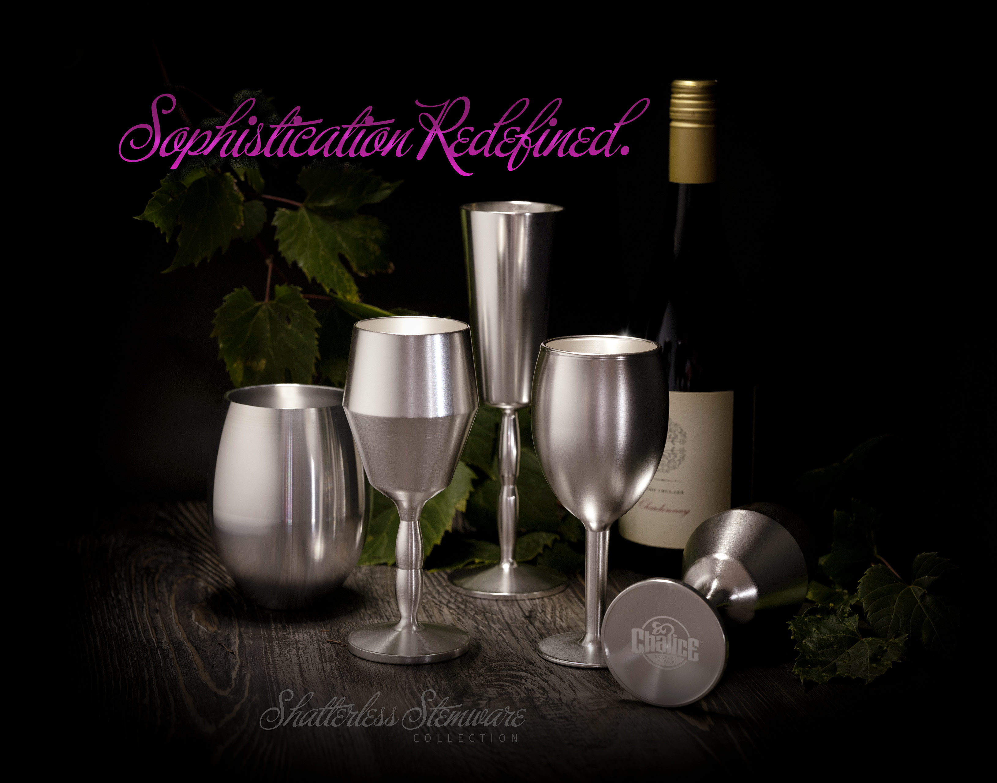 "Sophistication Redefined" heading with 5 glasses arranged with a wine bottle and grape vines
