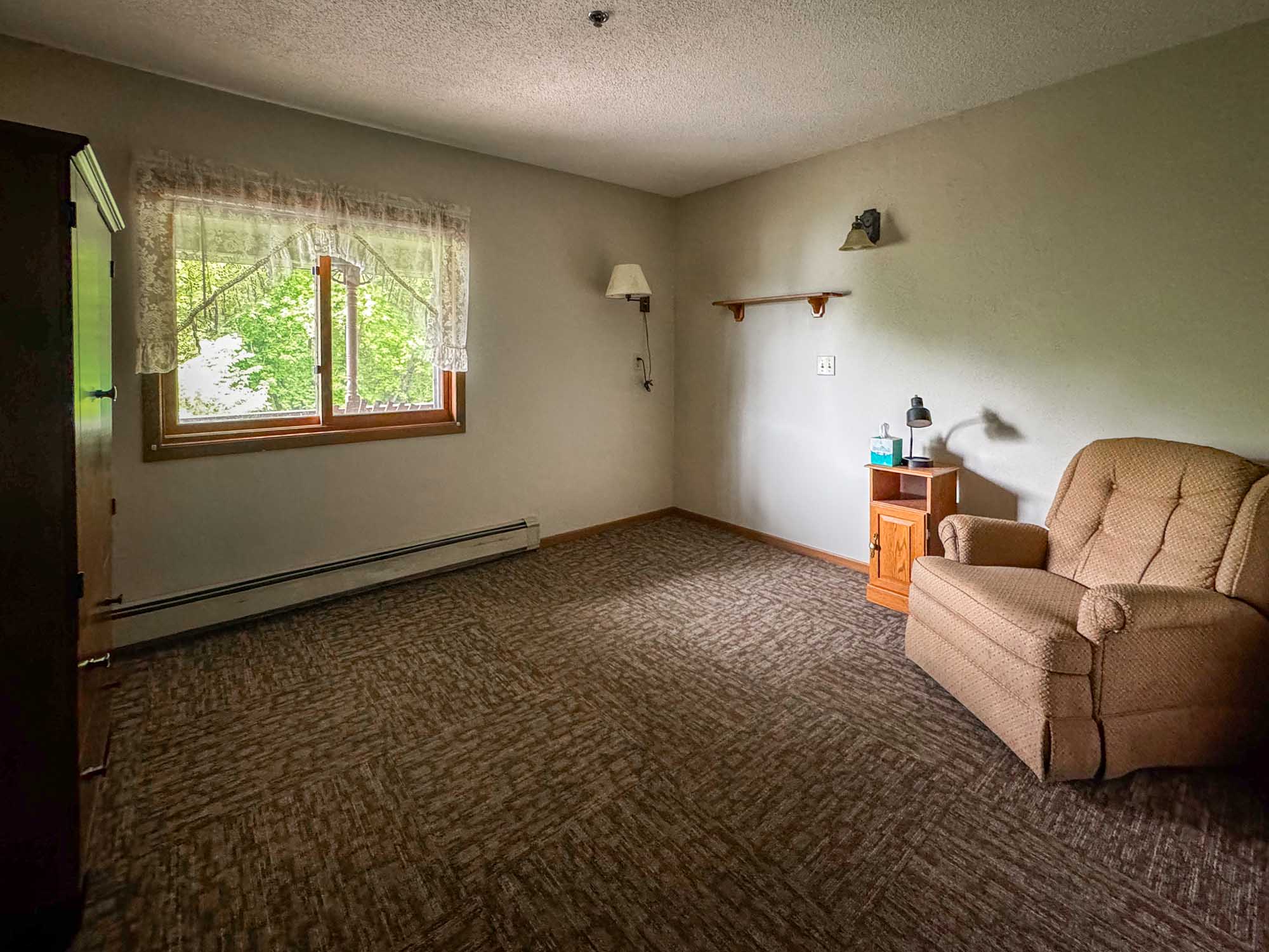 Brookside apartment with large windows