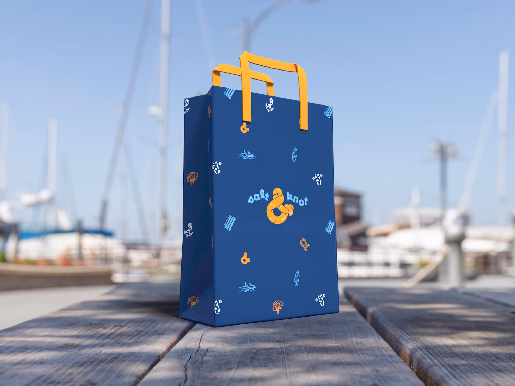 Salt & Knot paper bag design with beach illustrations