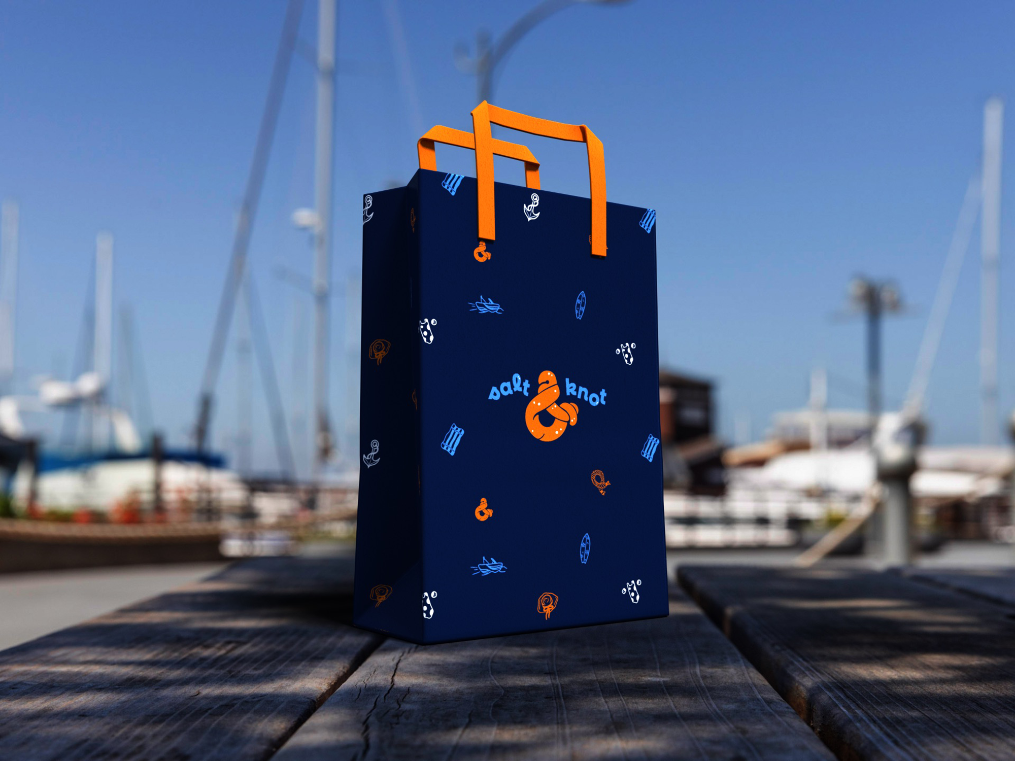Salt & Knot bag design with beach images and logo