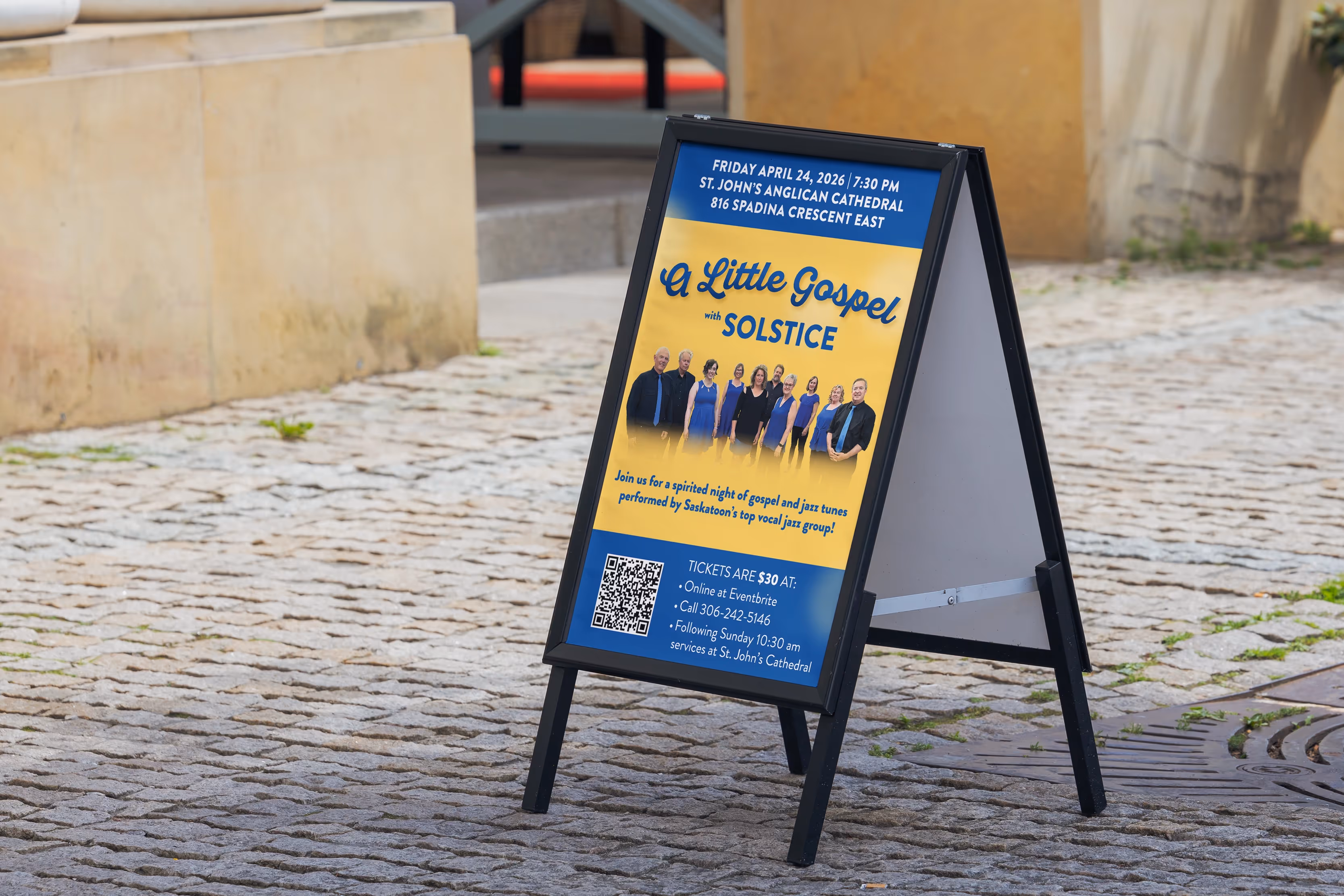 Sign on street advertising Solstice gospel concert