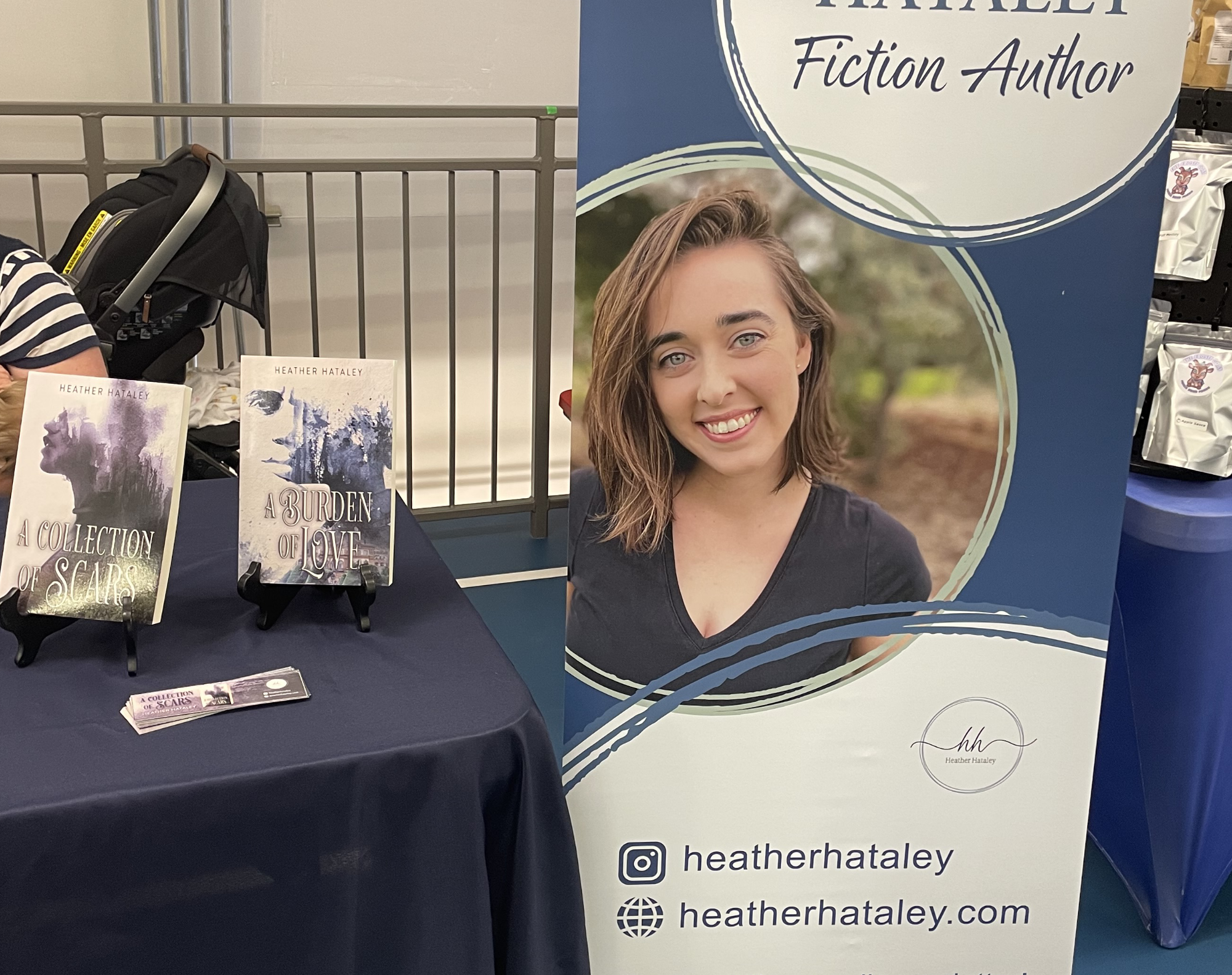 Heather Hataley banner at sales table