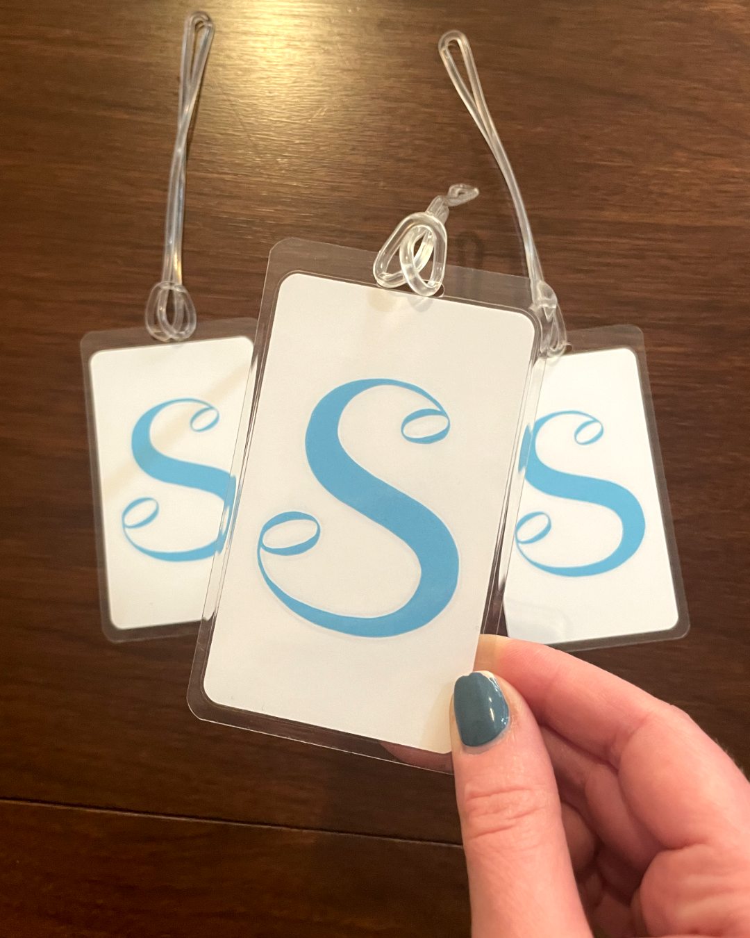 Laminate labels with the 'S' logo
