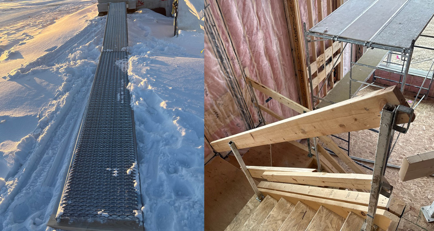 Construction site with a temporary walkway for the snow and a set of wooden stairs.