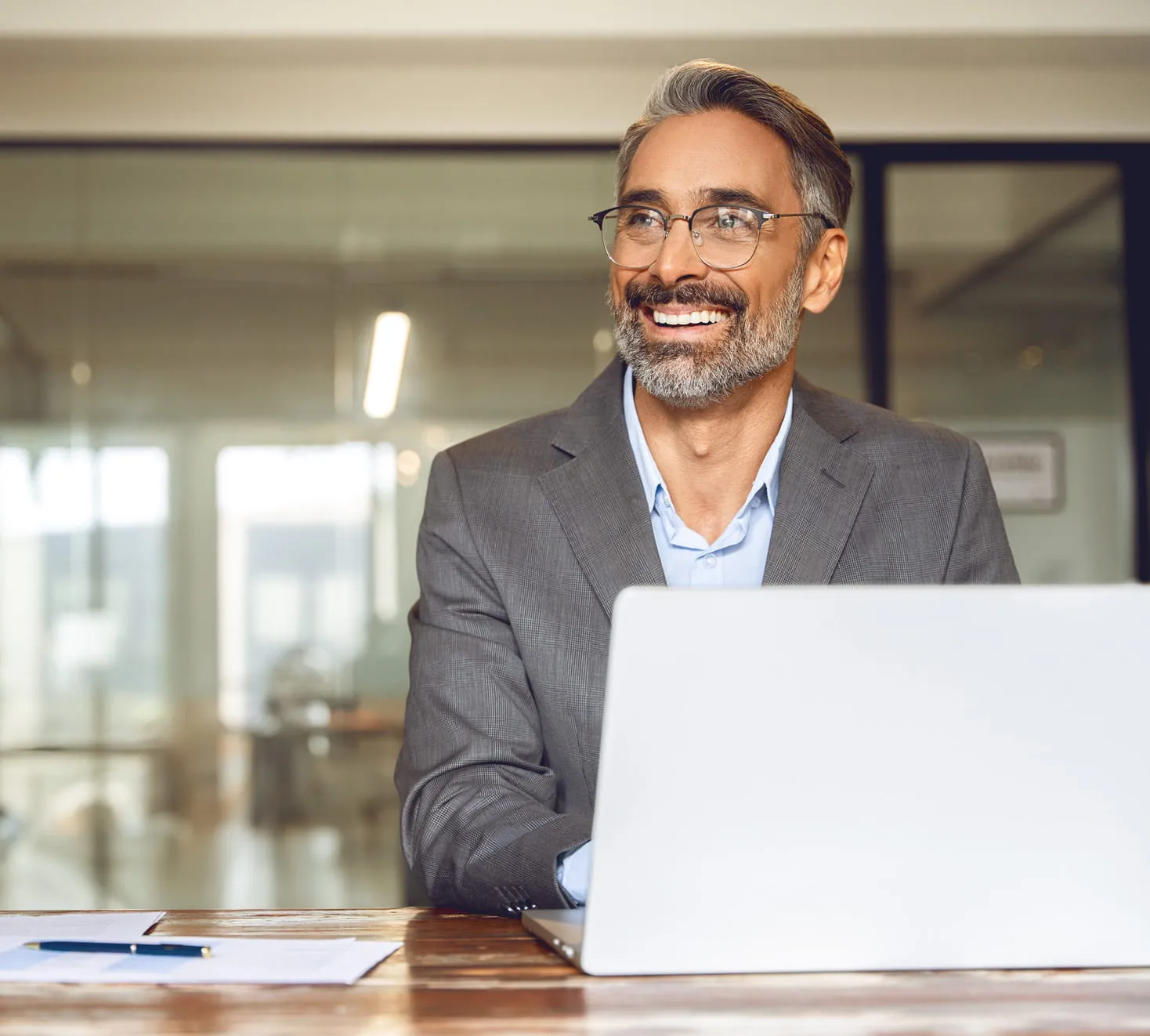 Business professional using a laptop