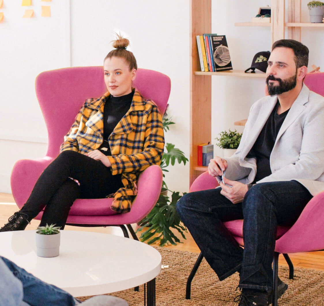 Group of workers listening during a casual meet.
