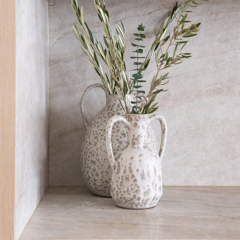 Flowers in Vase on Modern Kitchen Countertop.