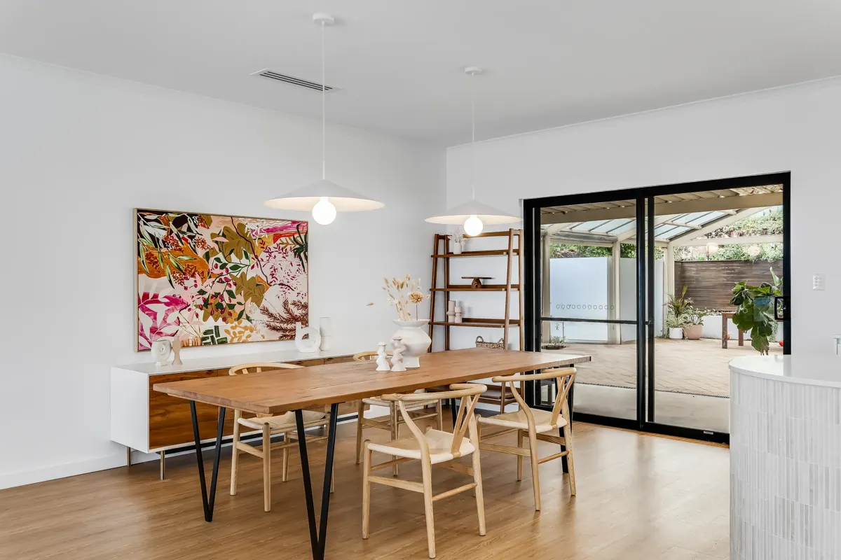 Dining area with timber table, pendant lights and sliding doors to the outdoor area, Jennifer Ave, Bellevue Heights