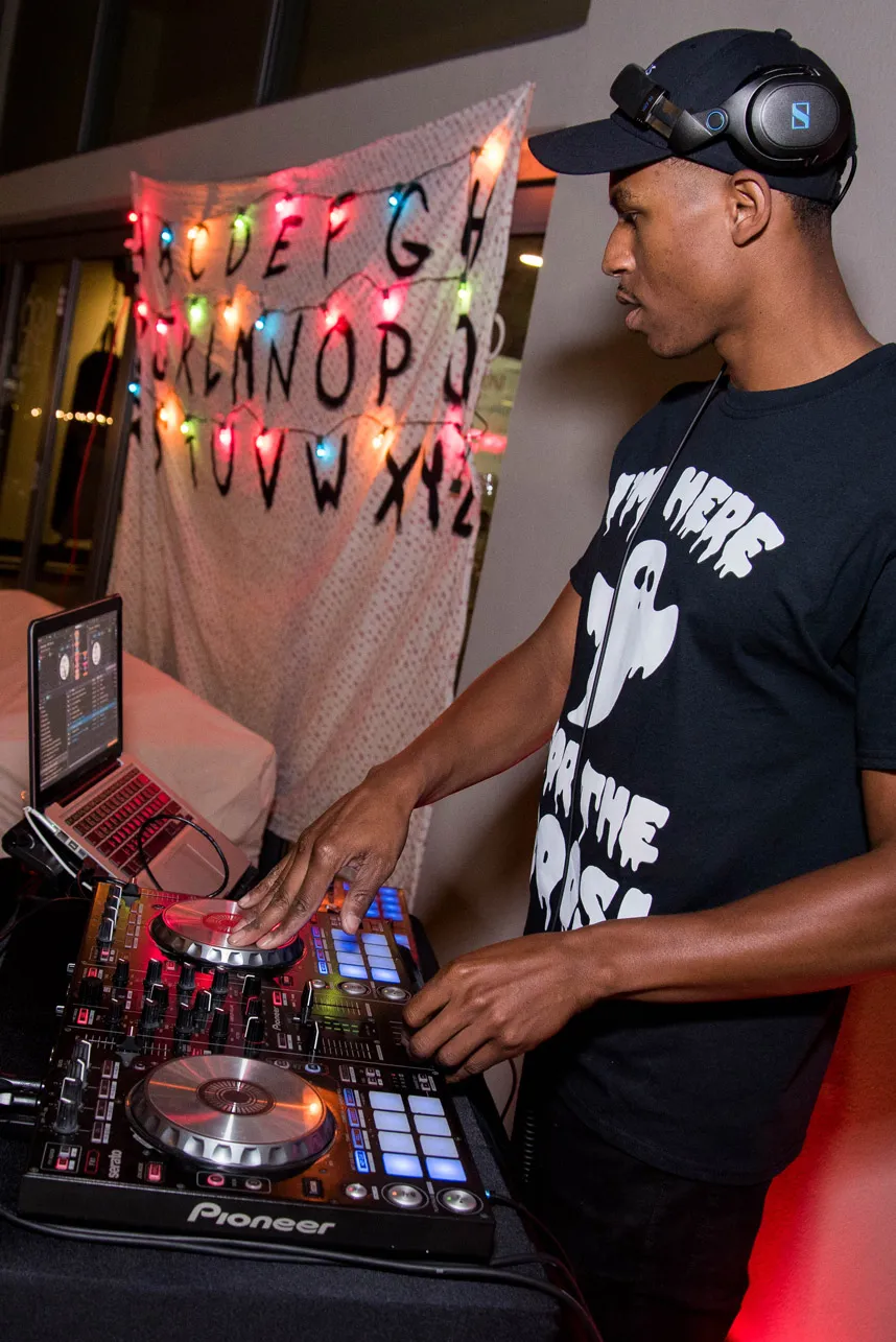DJ making music at turning tables