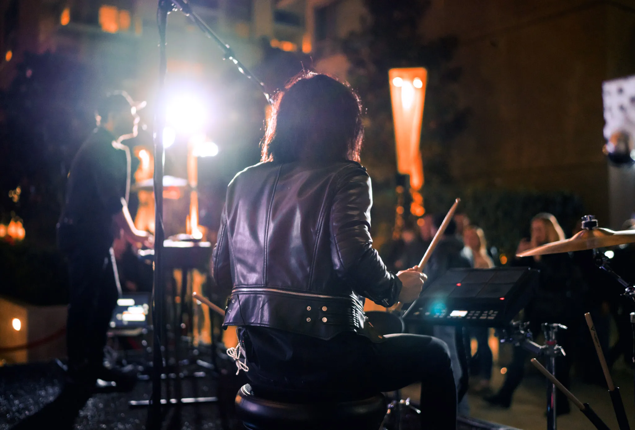 Shot of a drummer playing at a concert