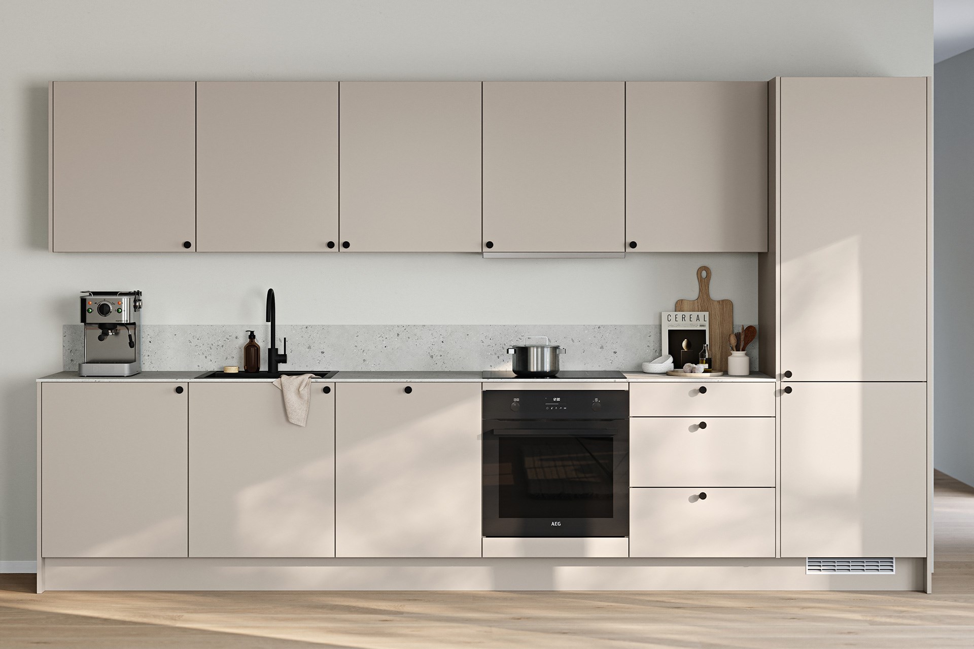 Moderne beige kjøkken med AEG-ovn, sort armatur, espressomaskin og terrazzo-benkeplate.