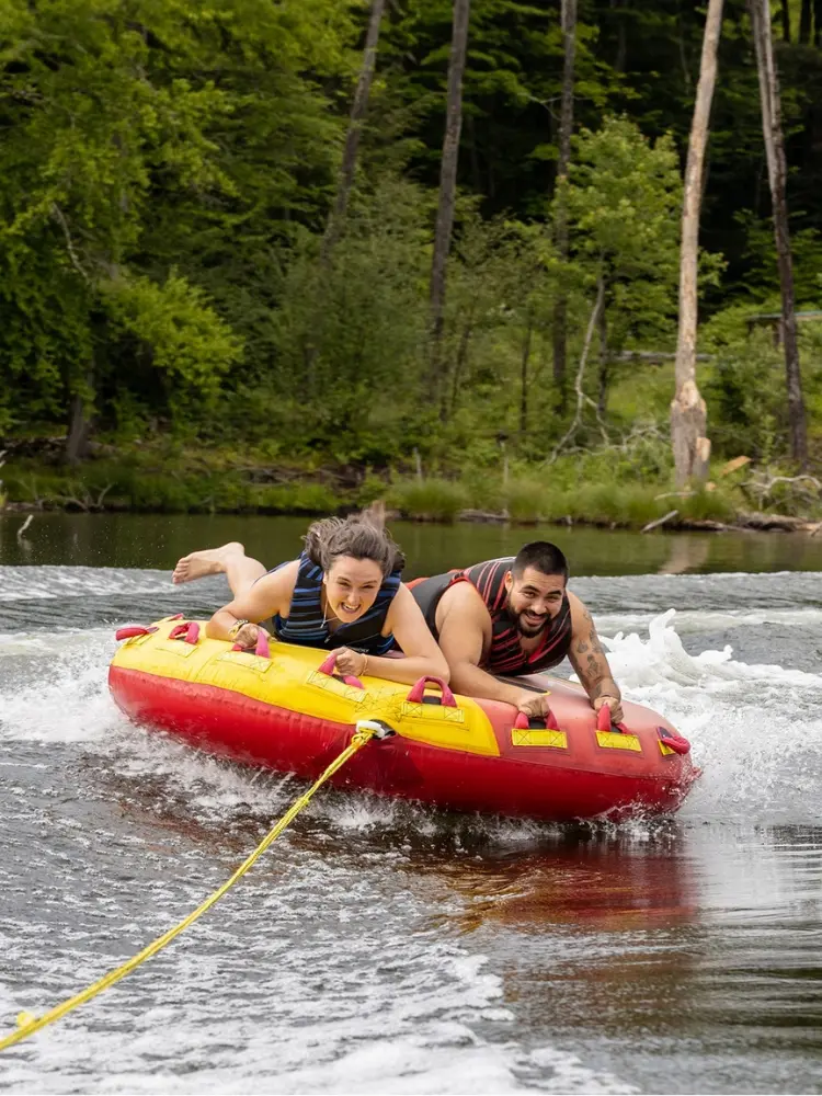 Australian student enjoying water sports at AmeriCamp summer camp in USA.