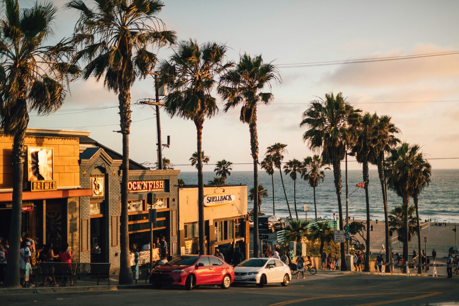 Surf towns in Los Angeles are filled with good food and good vibes, so that you can chill after a long day of surfing and tanning at the beach as a camp counselor in California.