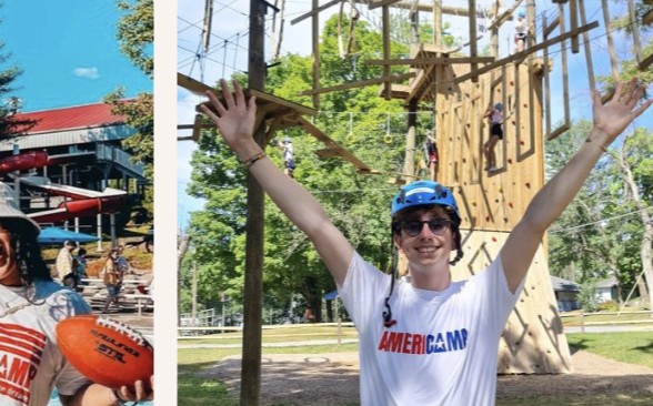 A boy posing in front of a climbing wall and ropes course at camp.