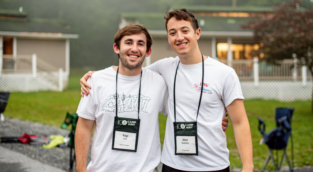 Two camp counsellors posing for a photo at Camp Airy for Boys