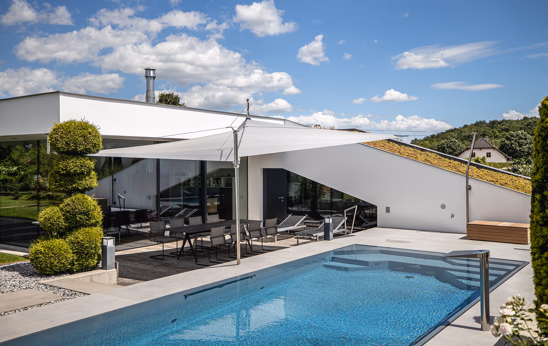 A refreshing dip in the pool, then straight to the lounger in the relaxing shade of a SunSquare sail.