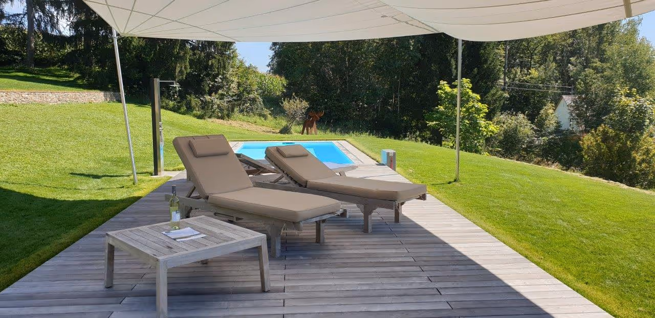 Ein SunSquare Höhenversteller manuell betrieben verlängert den Schatten bei tiefstehender Nachmittagssonne.