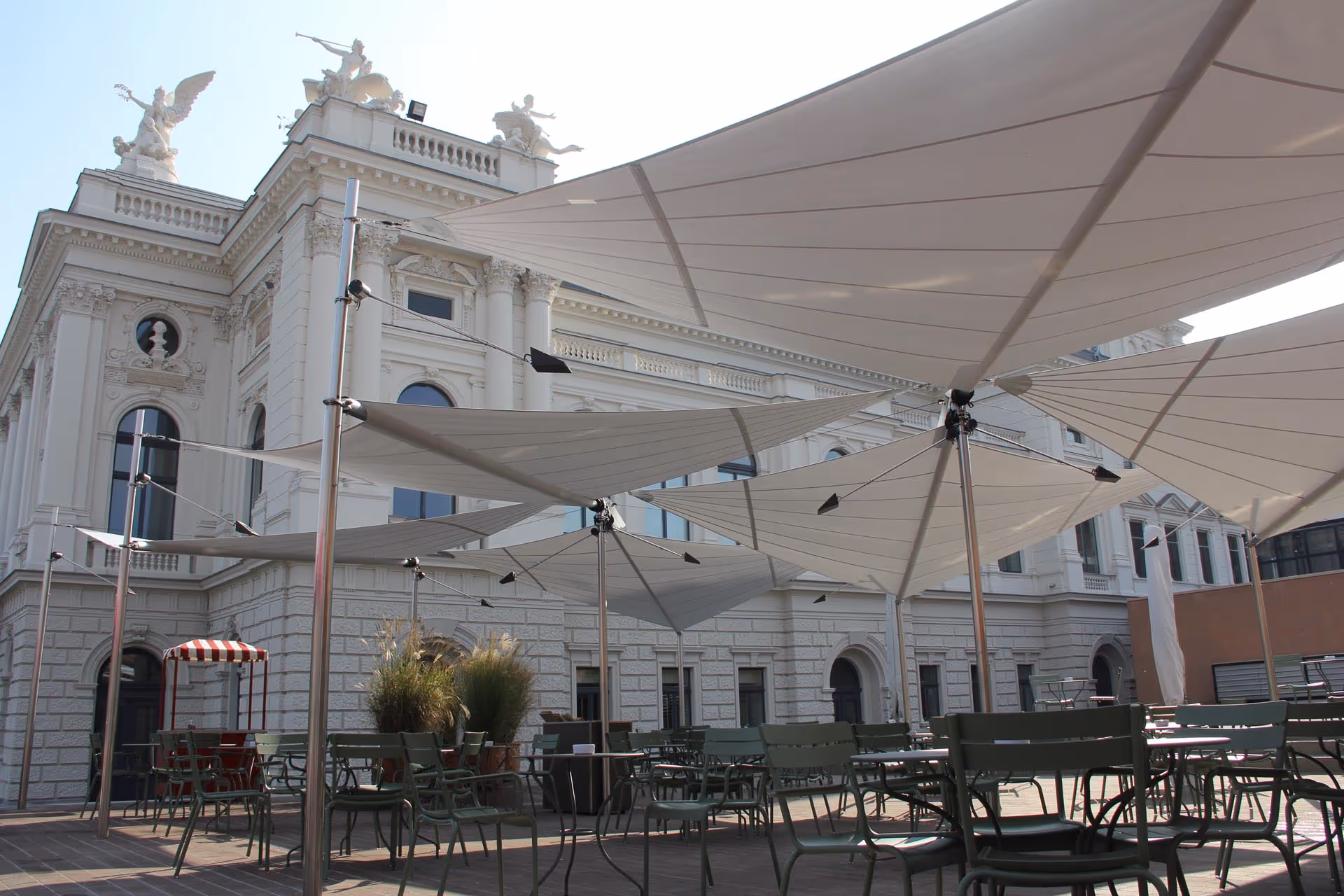 Six free-standing SunSquare radiation sails at Zurich Opera House, each 22 m² in size, made from Sattler 321-030, combined to form an elegant overall system.