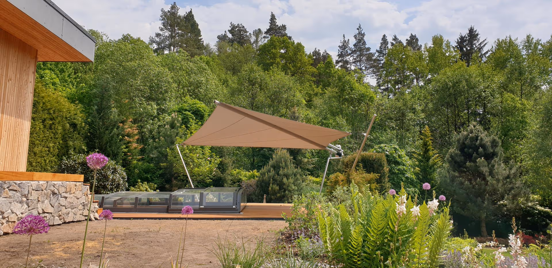 Cantilevered shaft over pool